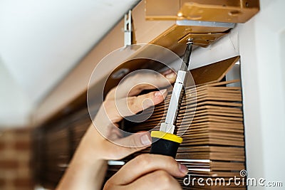 People installing window curtain home renovation improvement Stock Photo