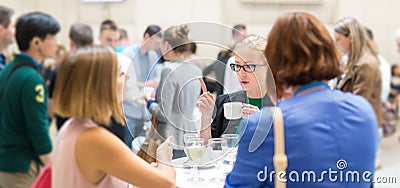 People interacting during coffee break at medical or scientific conference. Editorial Stock Photo