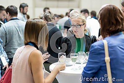 People interacting during coffee break at medical or scientific conference. Editorial Stock Photo