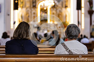 People at the Interior of the Minor Basilica of the Lord of Miracles located in the city of Guadalajara de Buga Editorial Stock Photo