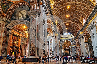 People at the interior of the Saint Peter Cathedral in Vatican Editorial Stock Photo