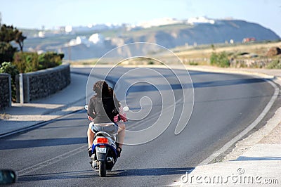 The people on the island of using motorcycle Editorial Stock Photo