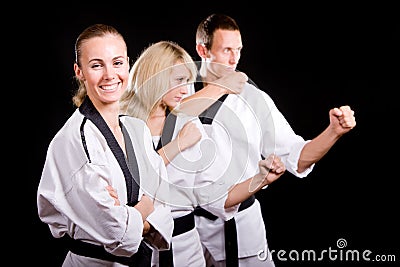 People in kimono make martial arts exercise Stock Photo