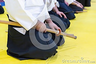 People in kimono on martial arts weapon training seminar Stock Photo