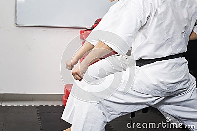 People in kimono training karate Stock Photo