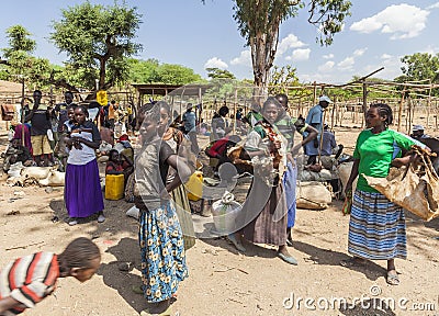 People from Konso tribal area at local village market. Omo Valley. Ethiopia Editorial Stock Photo