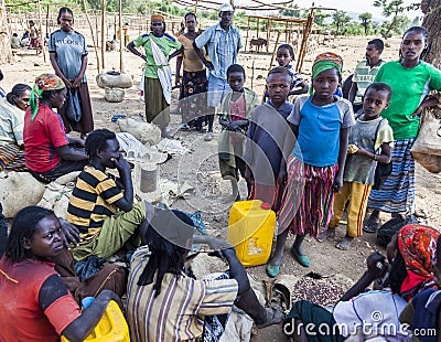 People from Konso tribal area at local village market. Omo Valley. Ethiopia Editorial Stock Photo