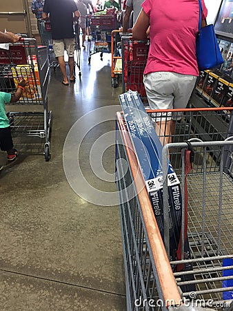 People leave Costco after shopping Editorial Stock Photo