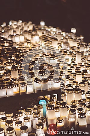 People lighting candles in the Kalevankangas cemetery in Tampere Editorial Stock Photo