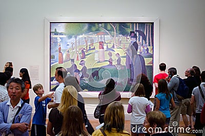 People looking at a famous painting Editorial Stock Photo