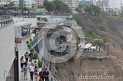 People looking the ocean from a pointview in Larco Mall in Lima, PerÃº Editorial Stock Photo