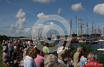 People looking at ships during Sail Amsterdam Editorial Stock Photo
