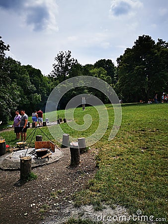 People making barbecue in the park Editorial Stock Photo