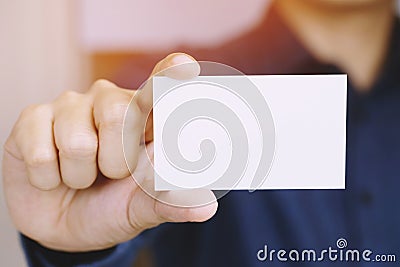 People man hand hold business cards show blank white card mock up Stock Photo