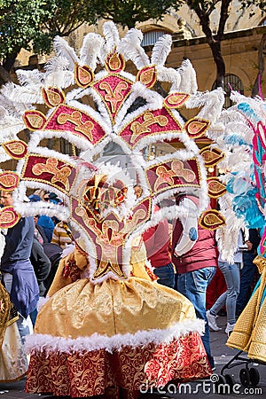 Annual Mardi Gras Fat Tuesday grand parade on maltese street of allegorical floats and masquerader procession Editorial Stock Photo