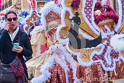 Annual Mardi Gras Fat Tuesday grand parade on maltese street of allegorical floats and masquerader procession Editorial Stock Photo