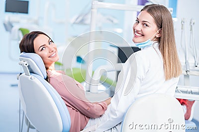People, medicine, stomatology and health care concept - happy fe Stock Photo