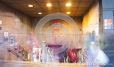 People in motion at London Underground station, rush hour photo. United Kingdom Editorial Stock Photo