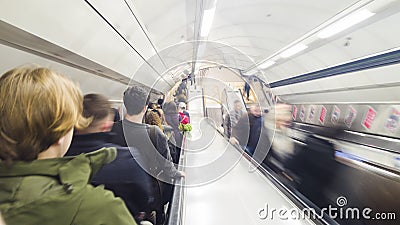 People in motion on subway stairs. Editorial Stock Photo