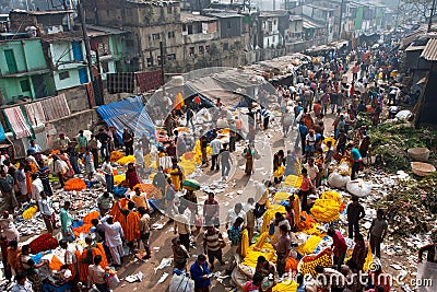 People move through giant Flower Market Editorial Stock Photo