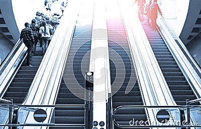 People moving in escalator Editorial Stock Photo