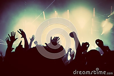 People on music concert, disco party. Vintage Stock Photo