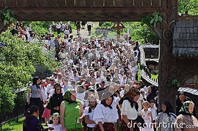 People in traditional national costume - landmark attraction in Maramures, Romania Editorial Stock Photo