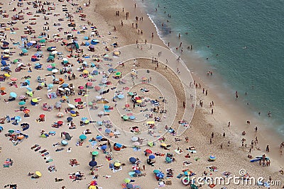People at Nazaré Beach, Portugal Stock Photo