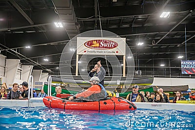 TORONTO, ONTARIO, CANADA - FEBRUARY 22, 2020: PEOPLE ATTEND THE OUTDOOR ADVENTURE AND TRAVEL SHOW AT THE INTERNATIONAL CENTRE. Editorial Stock Photo