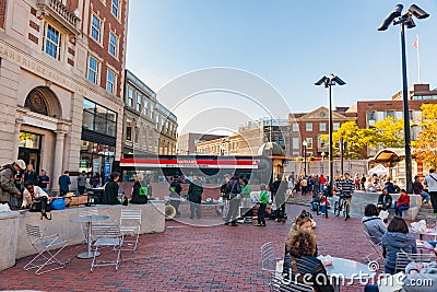 People outdoors at entrance to Harvard Train Station Editorial Stock Photo