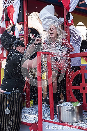 People Parade at the carnival with confettis Editorial Stock Photo