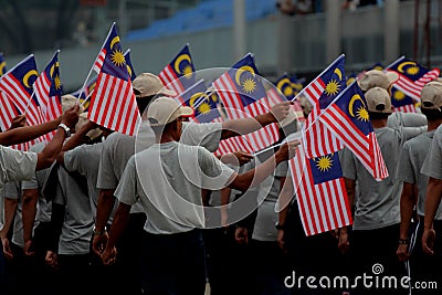 People parading the Malaysian flags in conjunction of Malaysia independence day Editorial Stock Photo
