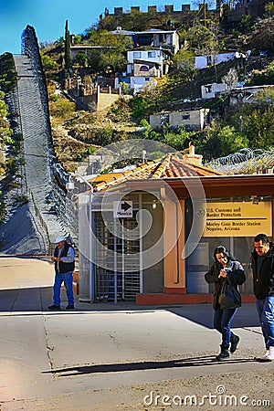 People passing through the U.S. Customs and Border gate from Mexico into America Editorial Stock Photo