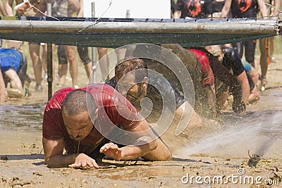 People passing under the wires Editorial Stock Photo