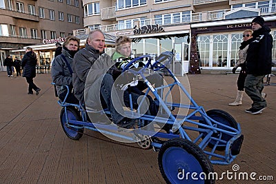 People in a peddle cart, Ostend, Belgium Editorial Stock Photo