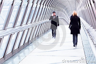 People on a pedestrian bridge Editorial Stock Photo