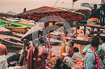 People Performing Hindu Rituals at Varanasi Ghat. Banaras Uttar Pradesh India, January 5th, 2024 Editorial Stock Photo
