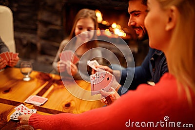 People playing card game Stock Photo