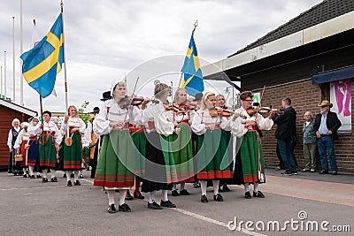 People playing folk music and marching Editorial Stock Photo