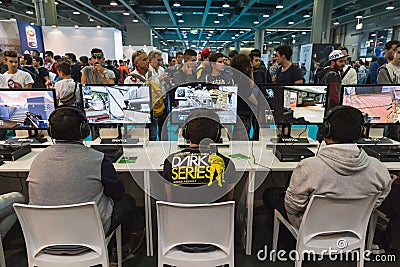 People playing at Games Week 2014 in Milan, Italy Editorial Stock Photo