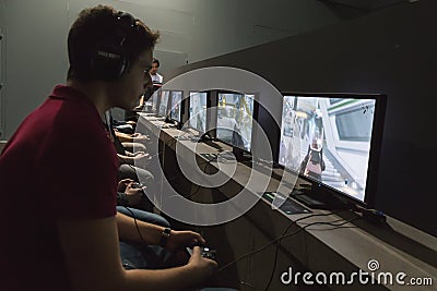 People playing at Games Week 2014 in Milan, Italy Editorial Stock Photo