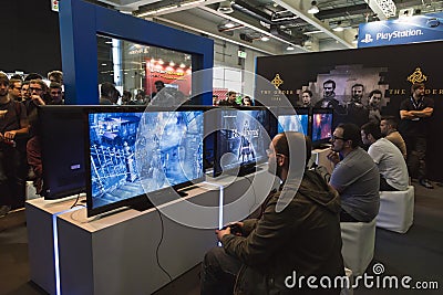 People playing at Games Week 2014 in Milan, Italy Editorial Stock Photo