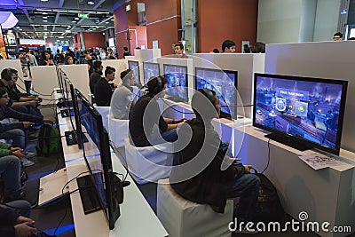 People playing at Games Week 2014 in Milan, Italy Editorial Stock Photo