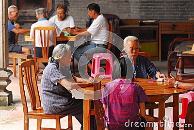 People playing mahjong Editorial Stock Photo