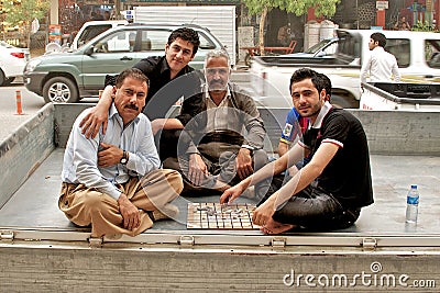 People playing traditional board game, Arbil, Autonomous Kurdistan, Iraq Editorial Stock Photo