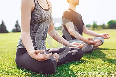 People practice acro yoga outdoors healthy lifestyle Stock Photo