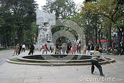 People are practising tai-chi in a public garden in Hanoi (Vietnam) Editorial Stock Photo