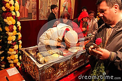 People praying at the relics Editorial Stock Photo