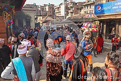 People on a procession for a Hindu sacrifice at Bhaktapur in Nepal Editorial Stock Photo