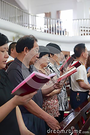 People reading bible Editorial Stock Photo